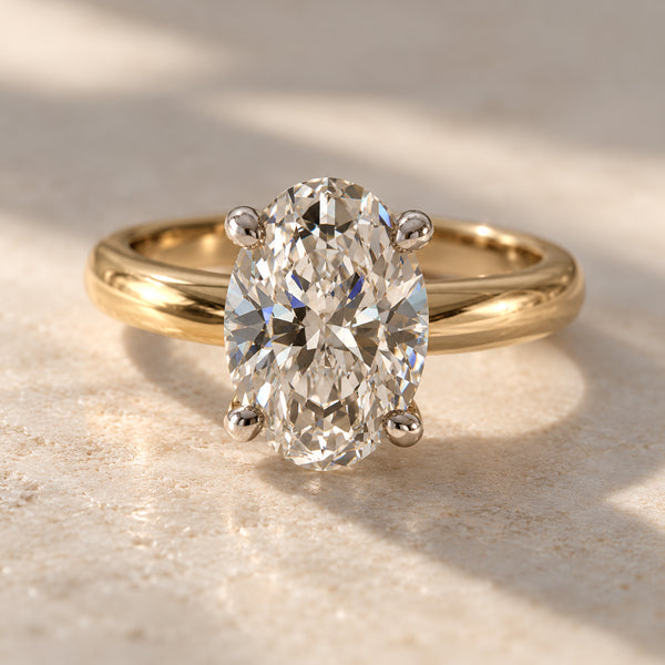 Oval Hidden Halo Engagement Ring – Yellow Gold