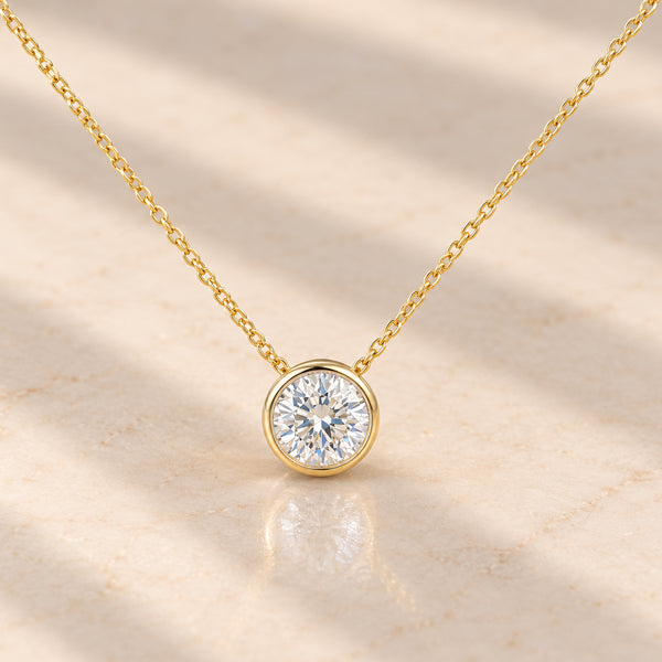 CLARETTE - 9ct Yellow Gold Diamond Pendant Rubover Set 0.57ct on Chain