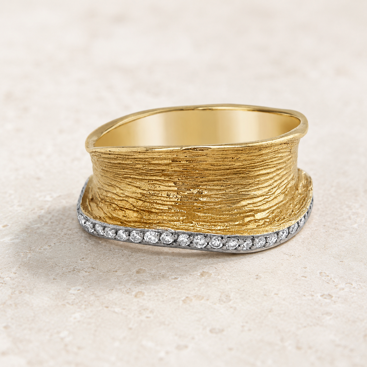 Older yellow gold and diamond ring ready to be redesigned through jewellery remodelling at Fishers Jewellers.